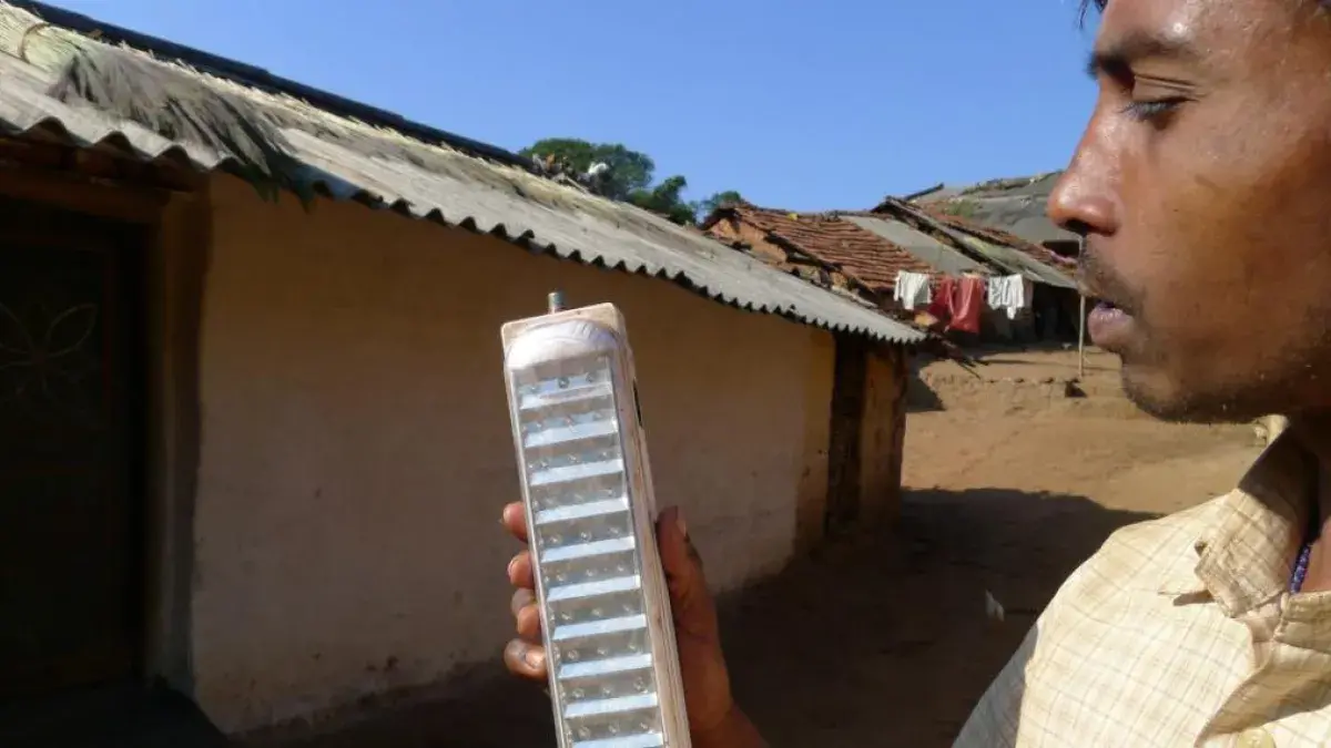 Person looking at a mobile solar panel