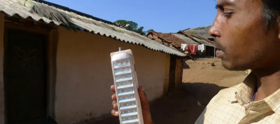 Person looking at a mobile solar panel